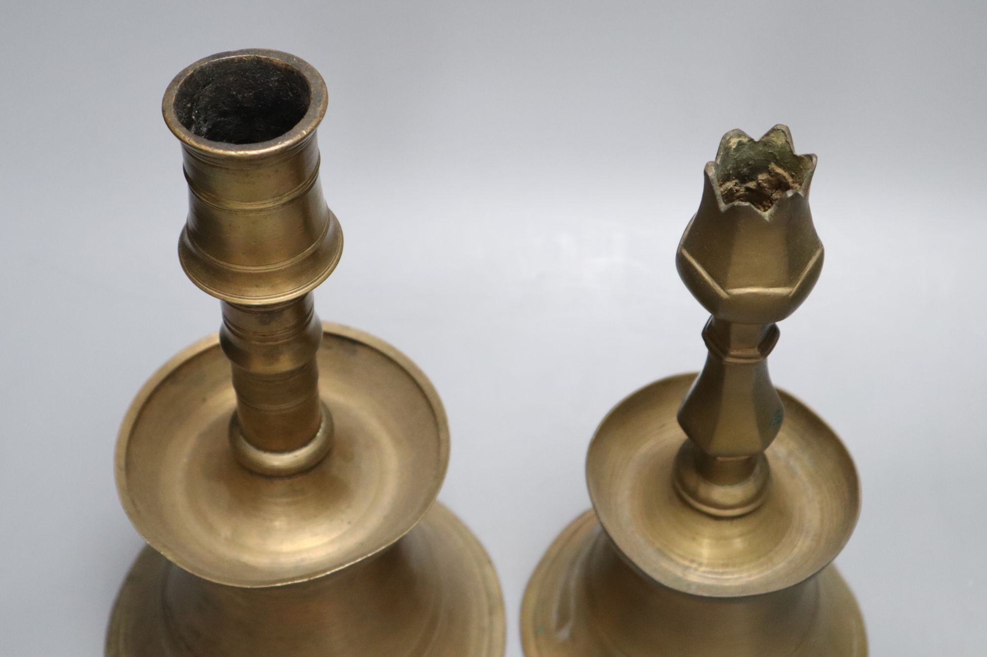 Two Ottoman brass candlesticks, height 28cm